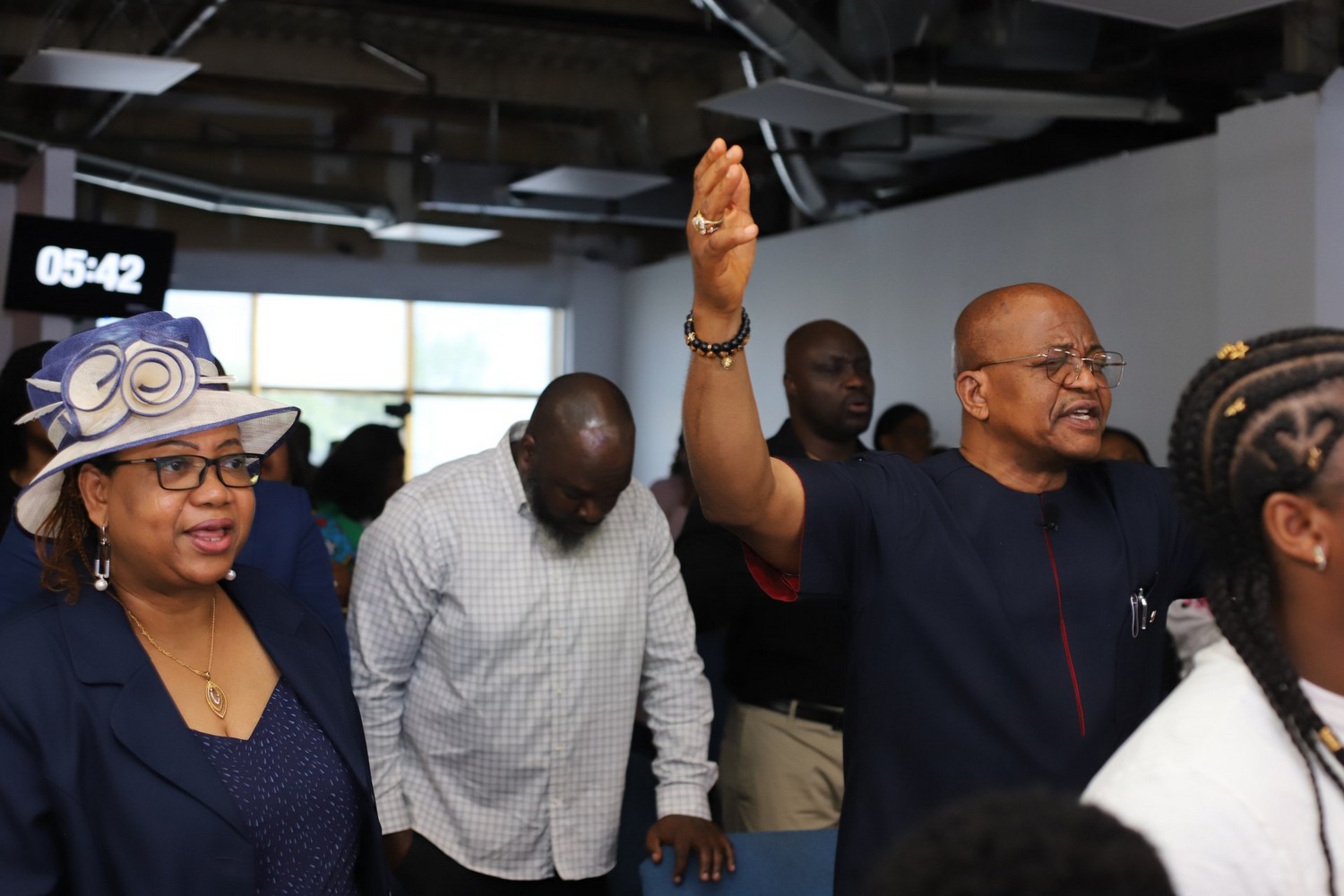 The congregation worshipping together on Sunday morning.